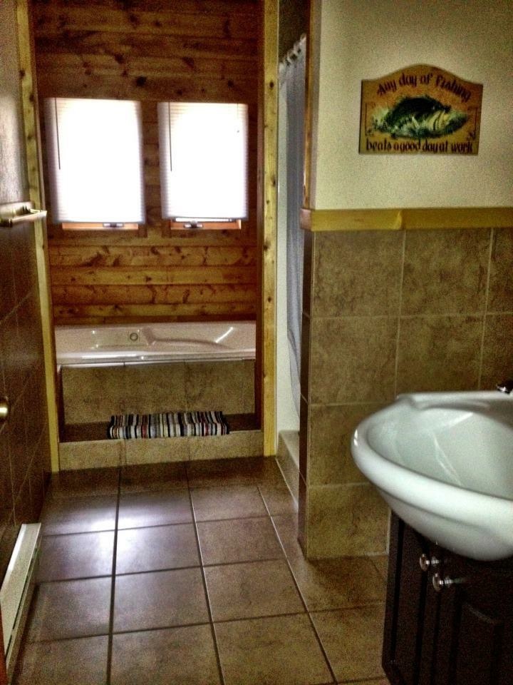Full size bathroom with garden tub